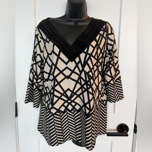 MELANIE LYNE size Large blouse/top. 
Black and Ivory geometric print.Stretchy